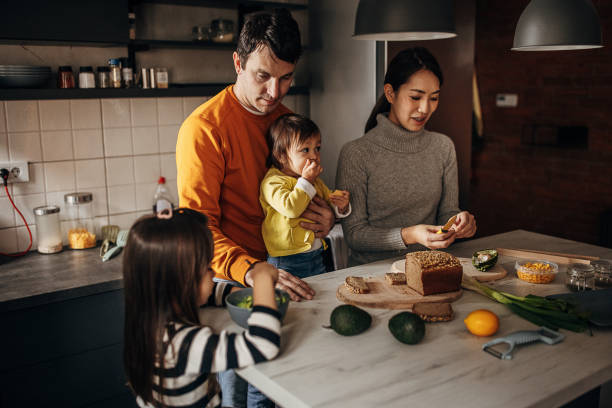 istock Family together in kitchen 1369293055