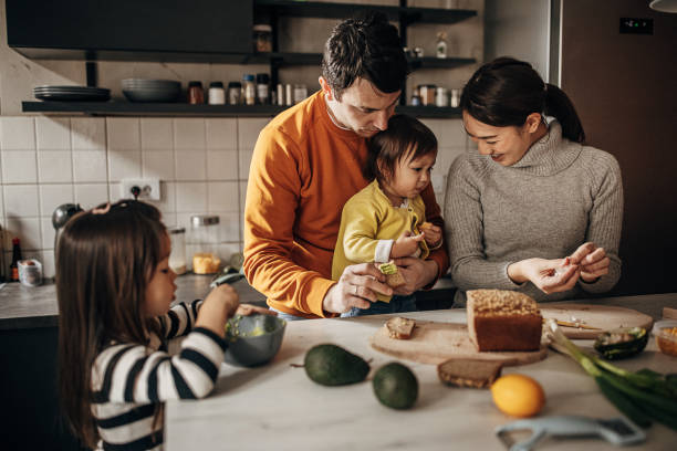 istock Family together in kitchen 1369294228