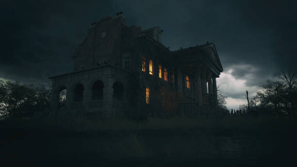 istock Abandoned creepy manor house with illuminated windows under a dark cloudy sky. 3D render. 1369299338
