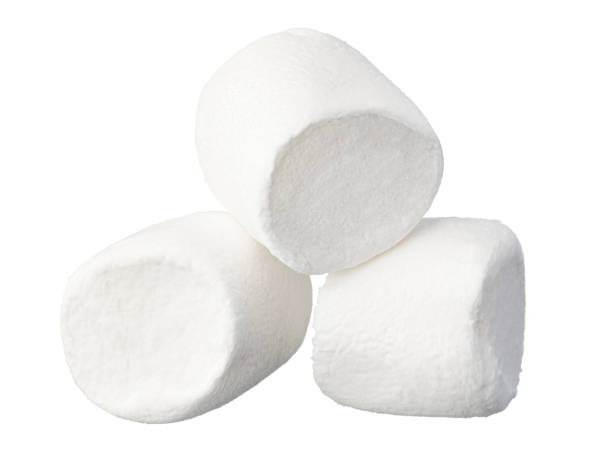 istock Heap of delicious marshmallows isolated on white background 1369299821