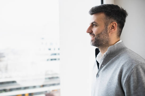 istock Businessman taking a break and enjoying the city view 1369299906