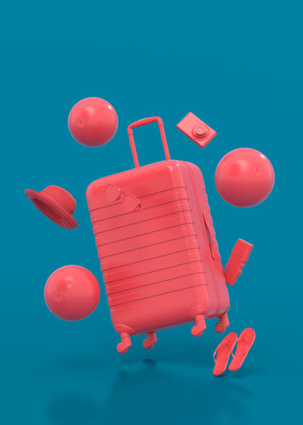 istock Colorful suitcase or baggage with beach accessories on blue background. 1369301579