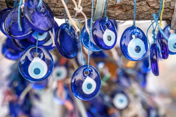 Evil eye amulets on a tree protect from bad energy using by Turkish culture