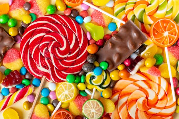 istock candies with jelly and sugar. colorful array of different childs sweets 1369307903