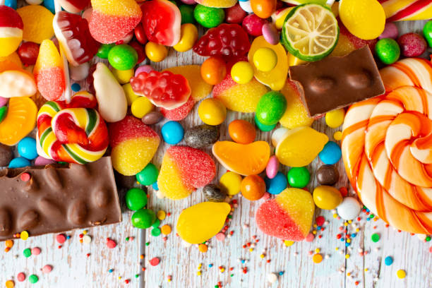 istock candies with jelly and sugar. colorful array of different childs sweets 1369307909