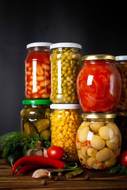 istock Jars with variety of pickled vegetables. 1369307912