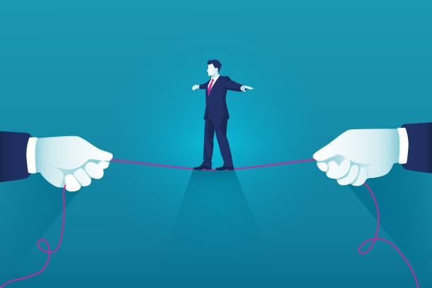 istock Businessman walking on tight rope. Risk challenge to success background 1369308003