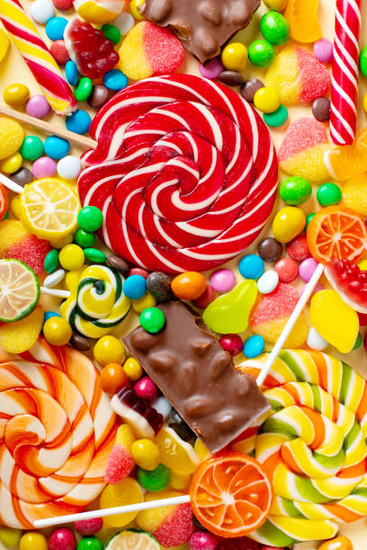 istock candies with jelly and sugar. colorful array of different childs sweets 1369308023