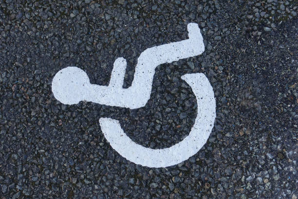 istock Parking space reserved for disabled people 1369308279