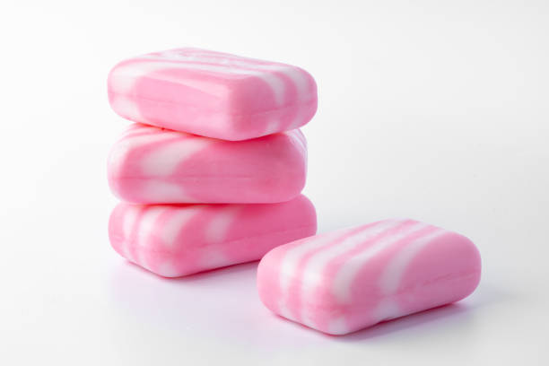 istock Pieces of pink soap isolated on white background 1369308554