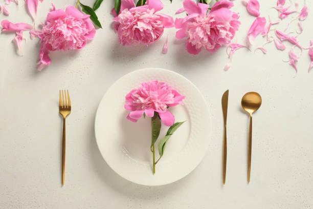 istock Elegance spring table setting with pink peony flowers. 1369308786