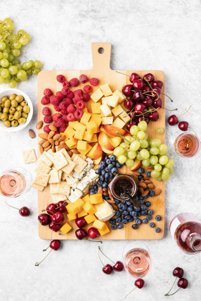 istock Summer cheese board served with rose wine, view from above 1369309799