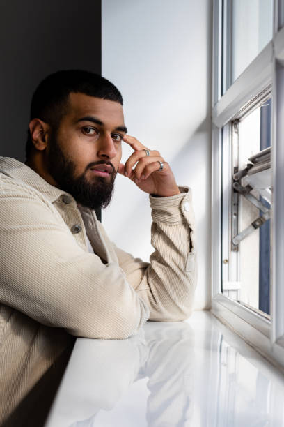 istock Watching out of his Window 1369312844