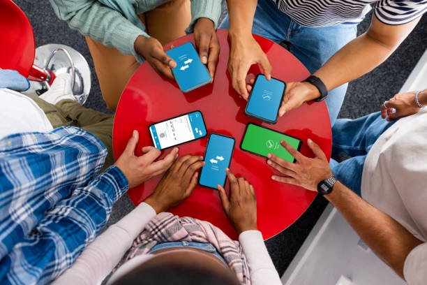 istock Bank Transferring Friends 1369314021