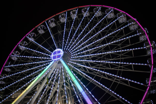 istock Ferris wheel in night-time Kyiv 1369315130