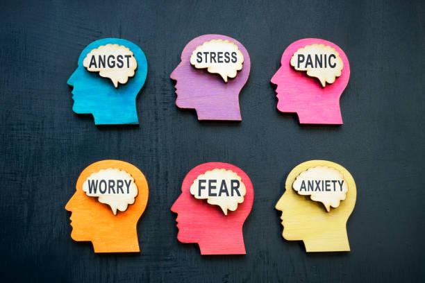 istock Human brains with words anxiety worry and panic. Stress at work. 1369315156
