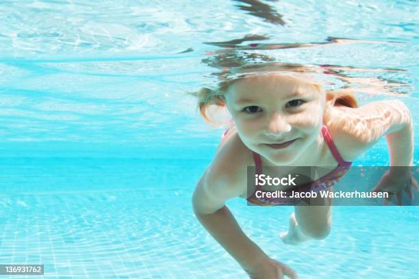 Escaping The Summer Sun Stock Photo - Download Image Now - Swimming, Child, Girls