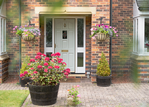 Entrance to old brick townhouse with bright red door