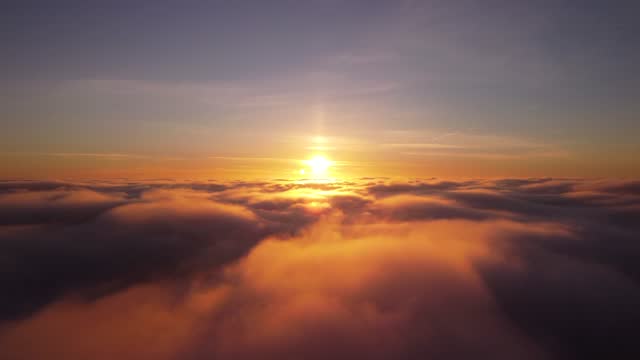 Cinematic drone video of flying above the clouds