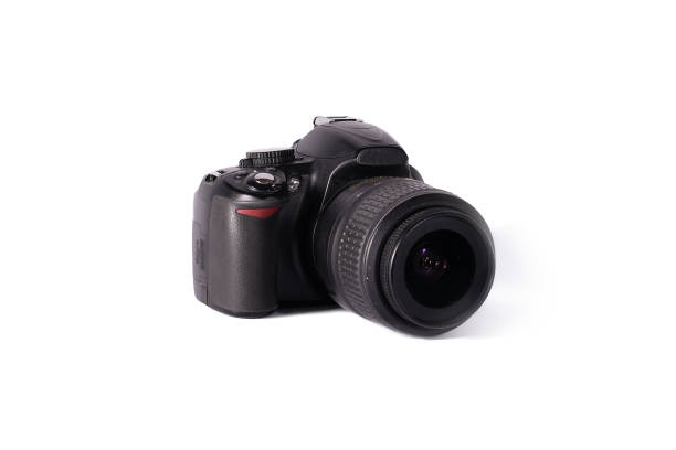 istock modern digital SLR photo camera with lens on white background. isolated. 1369325331