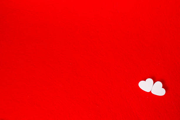Hearts on a red background. Valentine's Day. Selective focus. Valentine.