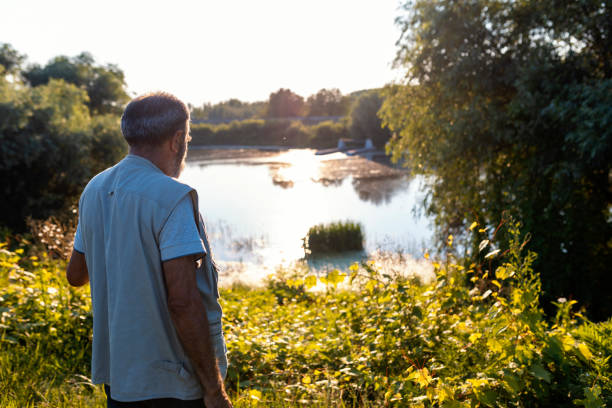 istock Active senior man on fishing 1369334239