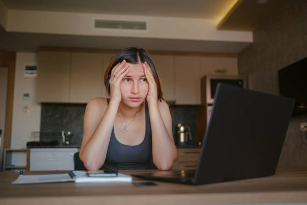 istock young asian woman at home, remote work 1369334936