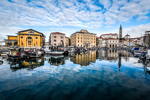 Surface Of Calm Sea In Harbor Near Zvonik Campanile Tower In Piran, Slovenia