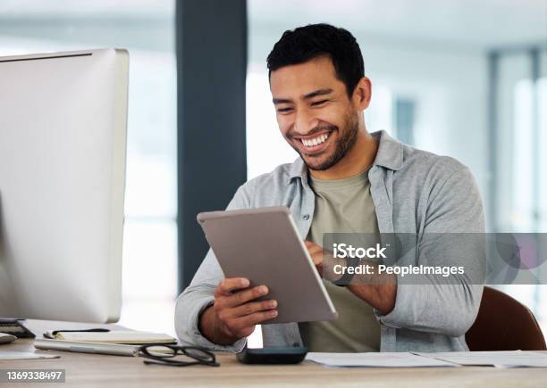 Shot Of A Young Businessman Using His Digital Tablet Stock Photo - Download Image Now