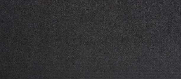 istock Surface of dark grey paper texture 1369342453