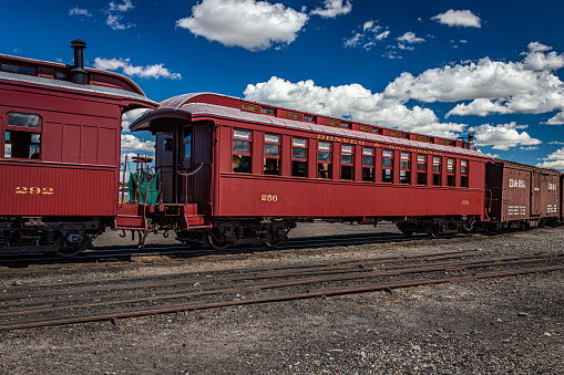 Antonito, CO - August 23, 2021: A vintage passenger car is backed out of the rail yard during a public steam up in the Cumbres and Toltec Railroad yard at Antonito, Colorado.