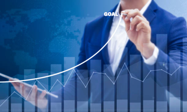 istock Growth success developments to goals concept. Businessman forecast analysis plan profit chart with pen and increase of positive indicators. Graph business stock turnover financial plan year. 1369343748