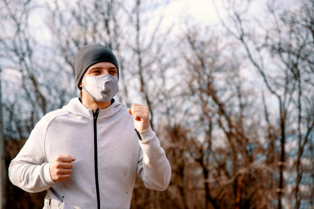 istock Man wearing Breathable mask suitable for running 1369347918