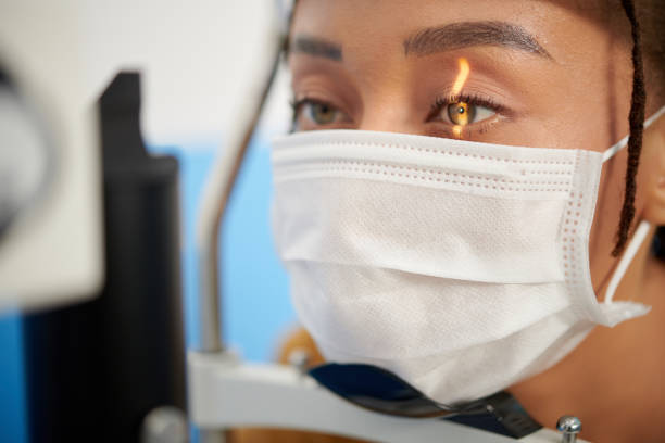 istock Woman Having Back of Eye Examined 1369347975