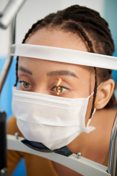 istock Patient Having Her Eyes Examined 1369347977