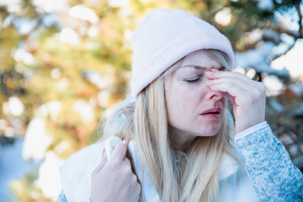 istock Sinus pain, sinusitis ache on cold day 1369349641
