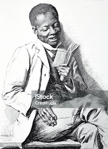 istock Black man reads a book and smiles 1369353097