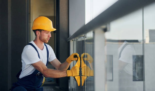 istock In protective wear. Young man working in uniform at construction at daytime 1369355342