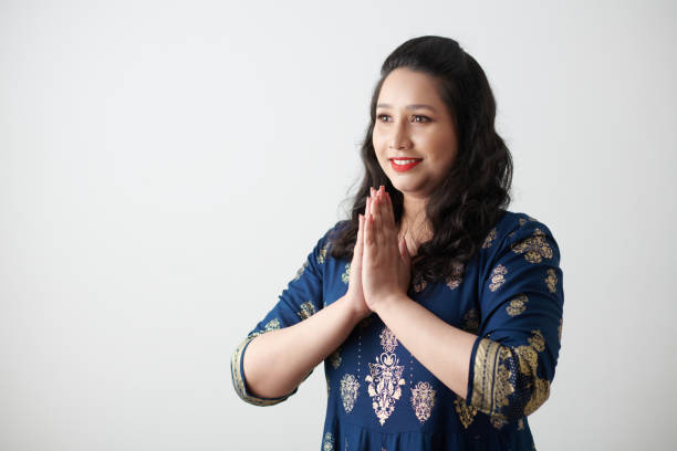 istock Indian Woman Making Greeting Gesture 1369357165