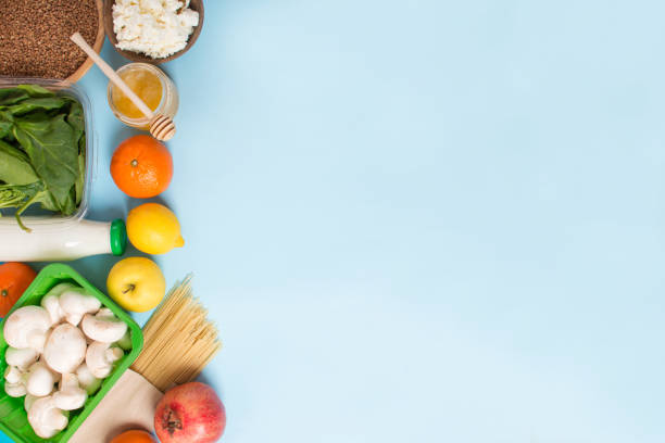 istock Big set organic food. Fresh raw vegetables. On a black chalkboard. 1369362826