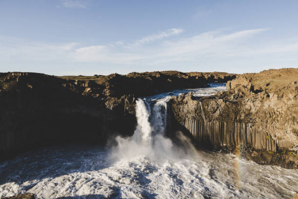 Beautiful Aldeyjarfoss Waterfall in Northern Iceland under blue summer sky. Aldeyjarfoss Waterfall close to Akureyri, Iceland, Nordic Countries, Northern Europe