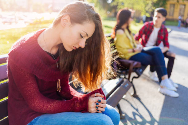 istock Teen girl feeling sad 1369364083