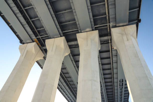 istock Four road bridge supports close-up. Engineering and architecture. Outdoors 1369366618