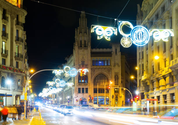 istock Barcelona streets in evening during christmas time 1369367764