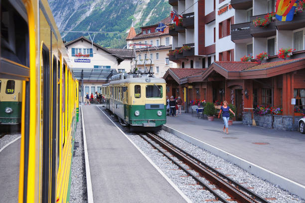 Grindelwald, Switzerland - July 09, 2012: Passenger train arrives to the platform.