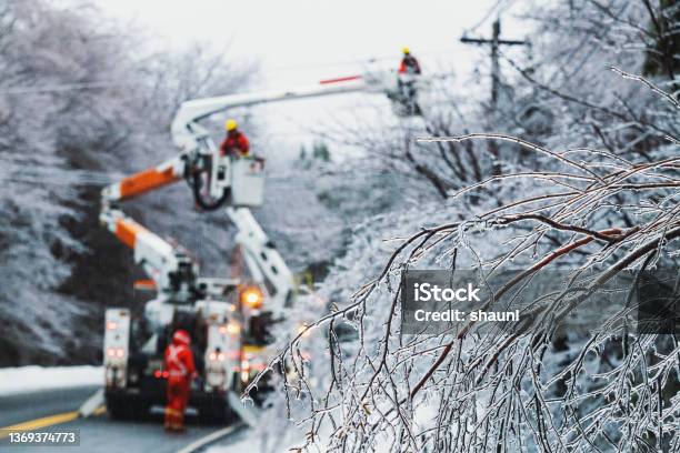 Restoring Power During Ice Storm Stock Photo - Download Image Now - Power Line, Storm, Power Cable