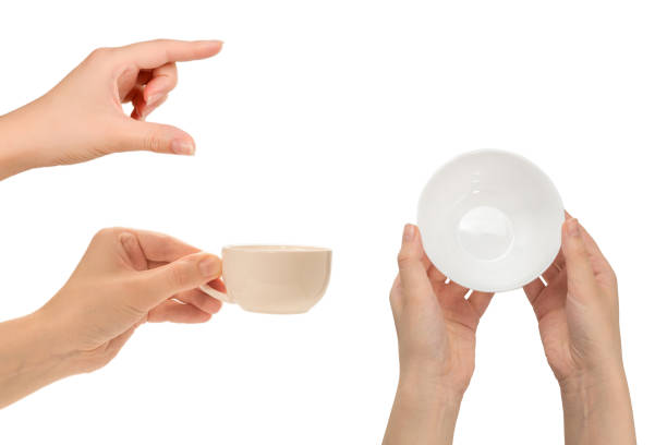 istock White bowl in woman hand isolated on white. 1369379203