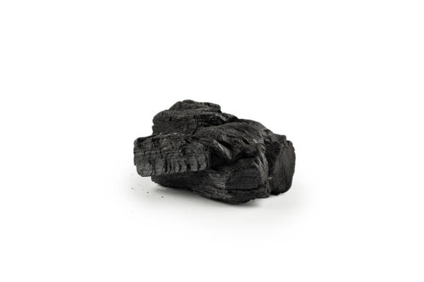 istock Black oak coal isolated on white background. 1369379258
