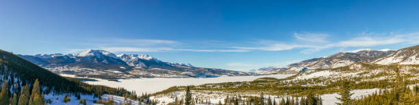 beautiful winter landscape with evergreen trees and ski tracks in the rocky mountains, colorado - lake dillon imagens e fotografias de stock