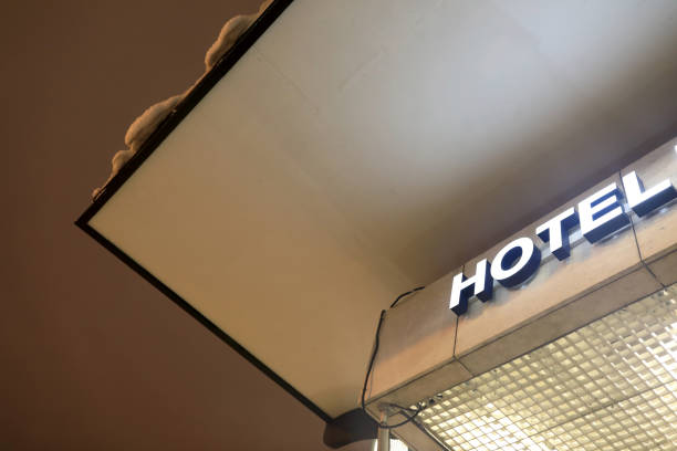 istock Hotel sign board at night 1369381054